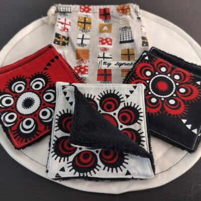 Lingette lavable traditionnel de Guyane, lot de 6 carrés démaquillants en tissu et éponge de bambou avec pochon un tissu traditionnel de Guyane aux teintes envoûtantes, mettant en scène de superbes motifs graphiques et floraux en noir, blanc et rouge éclatant.